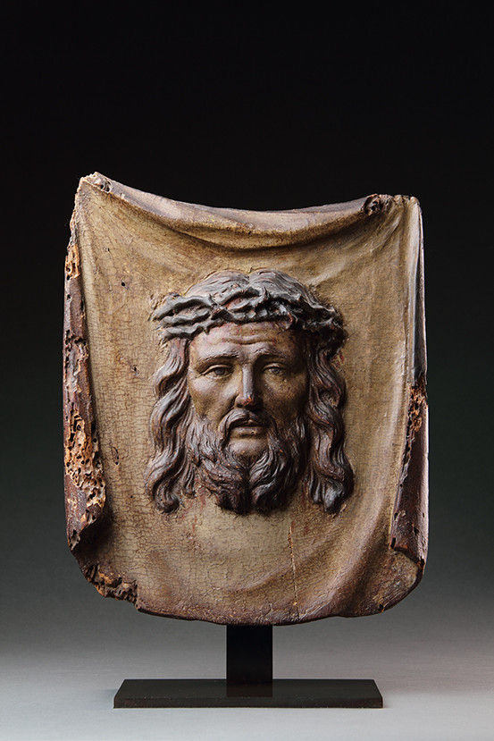 South German Carved Wood Panel Depicting the Image of the Crucified Christ upon a Shroud